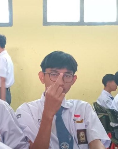 Low angle view up into a sky filled with deep blue clouds. 